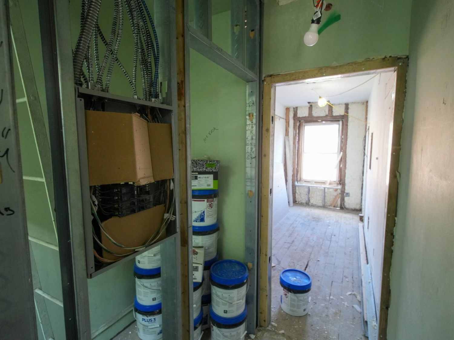 Interior renovation with construction materials and supplies.